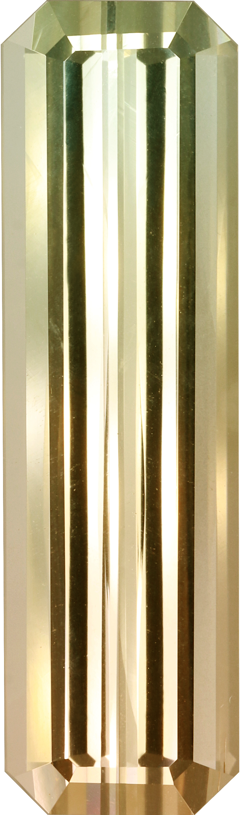 Rectangular cut bi colour tourmaline, 34.85 by 10.2 mm, shown at actual size