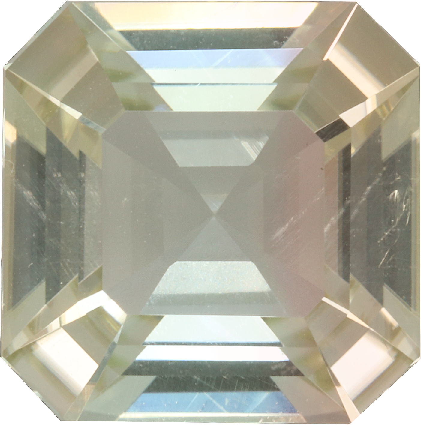 Rectangular cut yellow tourmaline, 11.11 by 11.05 mm, shown at actual size