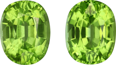Cushion cut peridot, 9.55 by 7.49 mm, shown at actual size