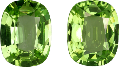 Cushion cut peridot, 9.57 by 7.57 mm, shown at actual size