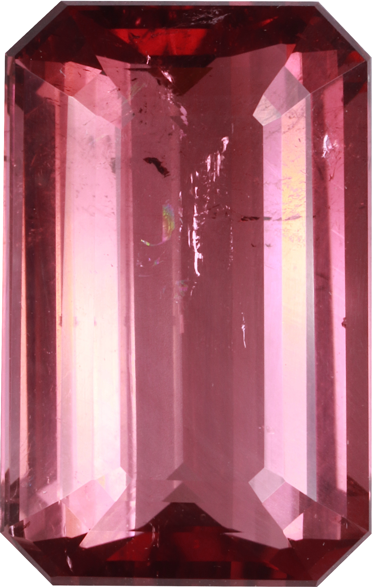 Rectangular cut pink tourmaline, 16.4 by 10.4 mm, shown at actual size