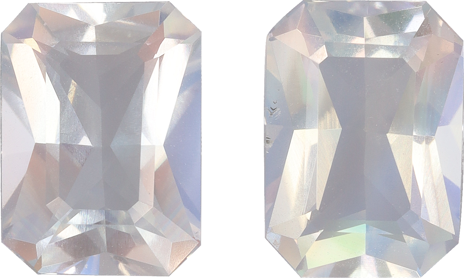 Rectangular cut rainbow moonstone, 9.72 by 7 mm, shown at actual size