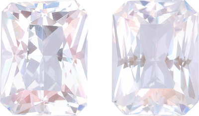 Rectangular cut rainbow moonstone, 8.58 by 6.25 mm, shown at actual size