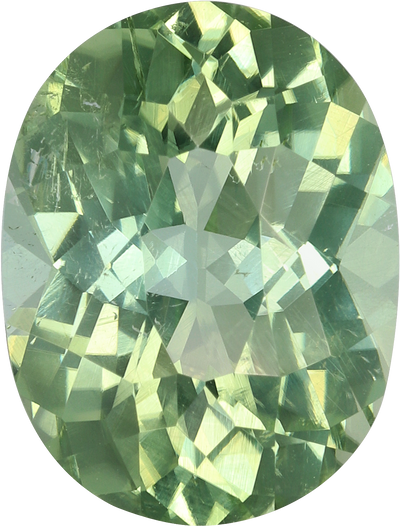 Oval cut green tourmaline, 13 by 10 mm, shown at actual size
