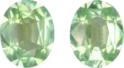Oval cut green tourmaline, 10.06 by 8.11 mm, shown at actual size