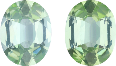 Oval cut green tourmaline, 14.14 by 11.03 mm, shown at actual size