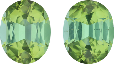 Oval cut green tourmaline, 14.47 by 11.51 mm, shown at actual size
