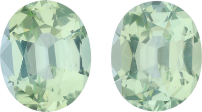 Oval cut green tourmaline, 11.47 by 9.28 mm, shown at actual size