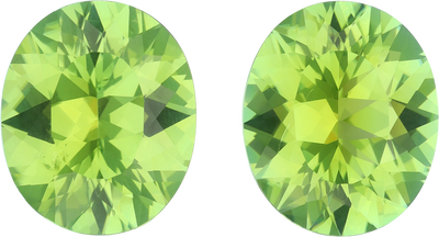 Oval cut green tourmaline, 14.57 by 12.17 mm, shown at actual size