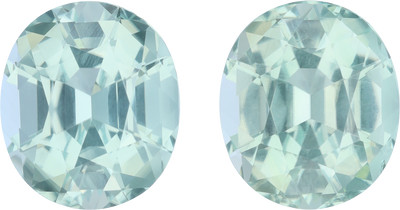 Oval cut green tourmaline, 13.94 by 12.03 mm, shown at actual size
