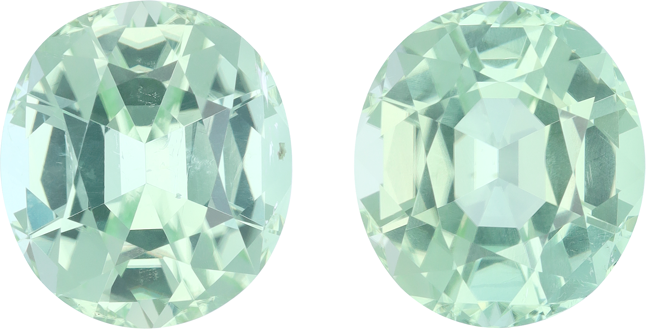 Oval cut green tourmaline, 13.58 by 12.1 mm, shown at actual size