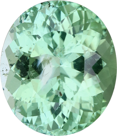 Oval cut green tourmaline, 11.57 by 10 mm, shown at actual size